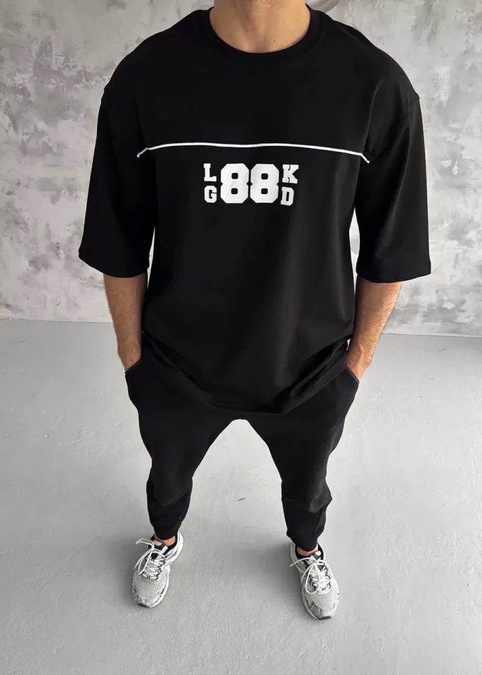 33ece192e9ee26d1d12d5cdb6bda57a8_84019-0.jpg Unisex Bisiklet Yaka Baskılı Oversize T-Shirt - Görsel 1